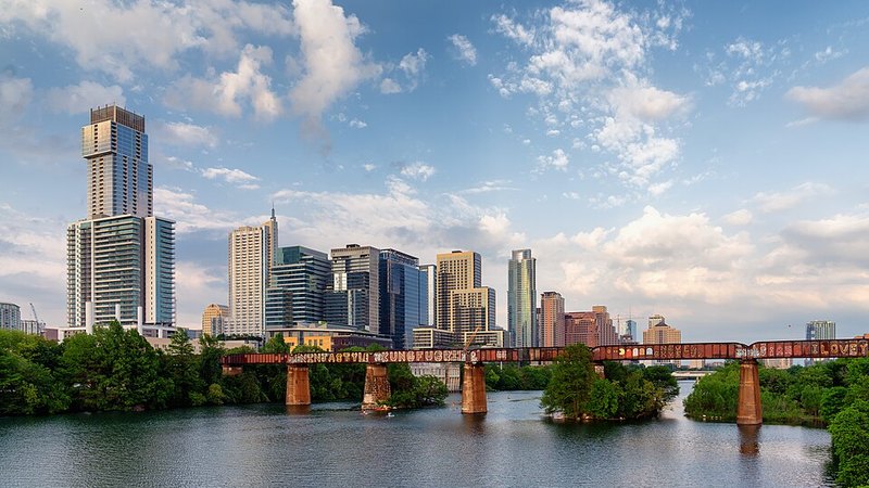 Austin skyline viewed from a pedestrian bridge over the Colorado River.