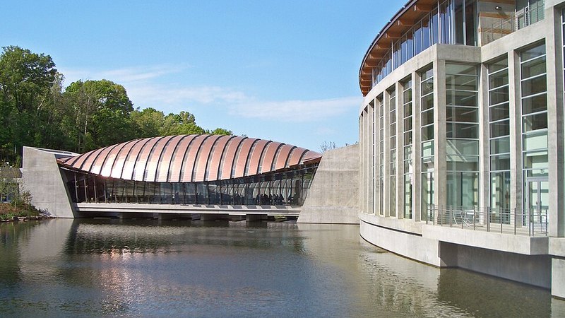 Crystal Bridges Museum reflected in water in Bentonville, Arkansas