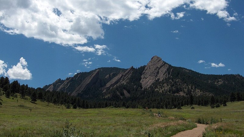 Boulder's Flatirons rising above the trails near Chautauqua Park