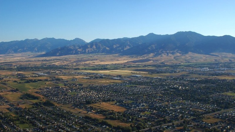 Aerial view of Bozeman with mountains in the background, Montana.