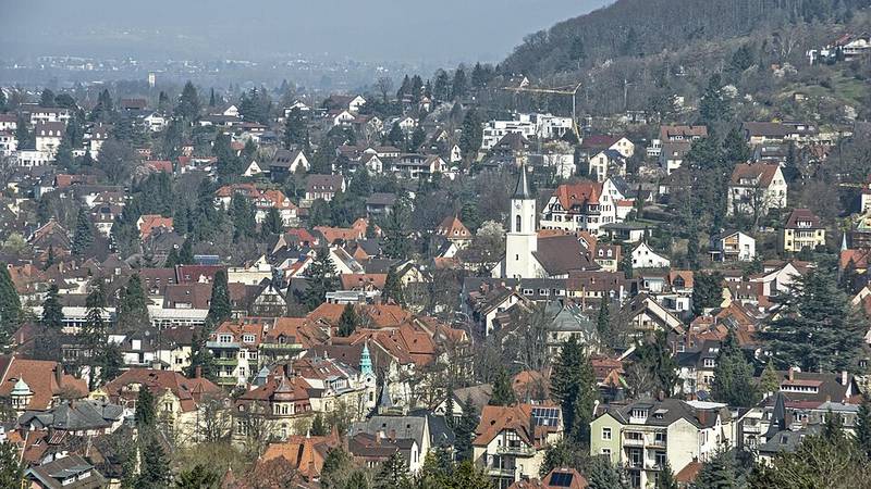 Freiburg im Breisgau rooftops and wooded hills seen from Dattler