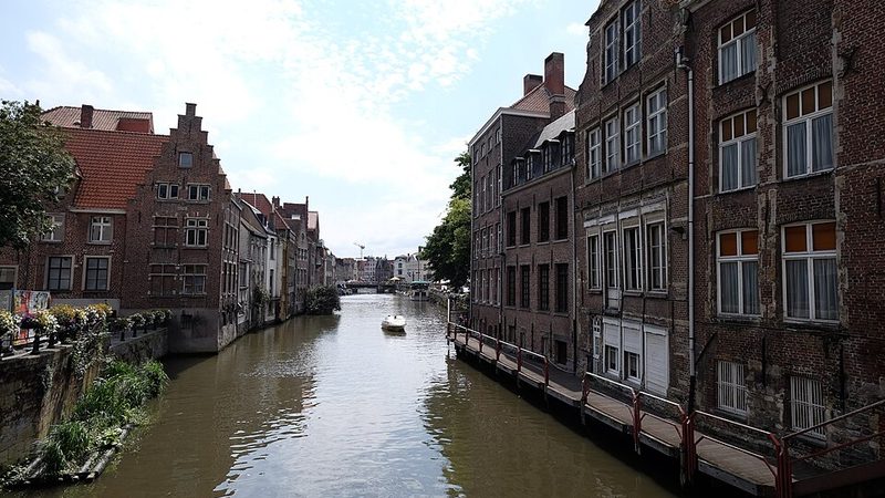 Historic buildings lining a canal in Ghent, Belgium