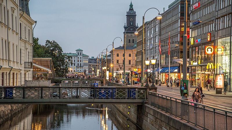 Canal and illuminated streets in central Gothenburg, Sweden.