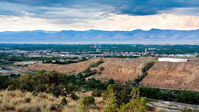Grand Junction and the surrounding Colorado landscape from an elevated viewpoint.