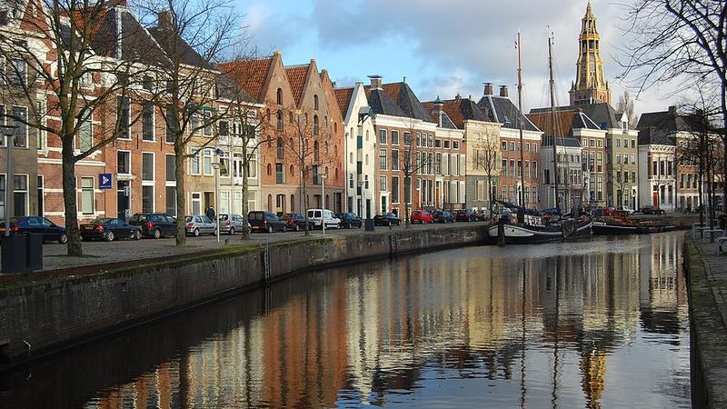 Historic warehouses along the Hoge der Aa canal in Groningen, Netherlands.