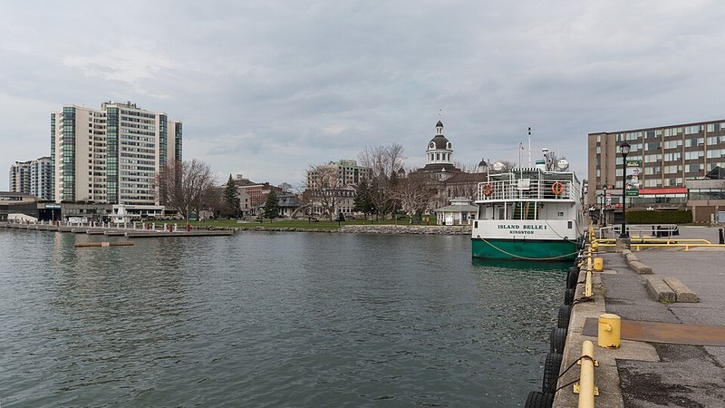 Kingston waterfront with City Hall and the Island Belle I boat in Ontario.