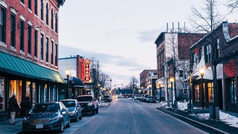 Downtown Rockland, Maine, with the Strand Theatre sign.