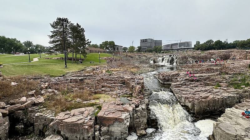 Waterfalls and stone riverbanks at Falls Park in Sioux Falls, South Dakota.