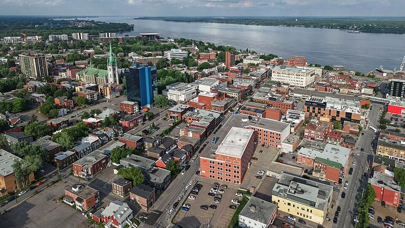 Aerial view of downtown Trois-Rivières and the St. Lawrence River.